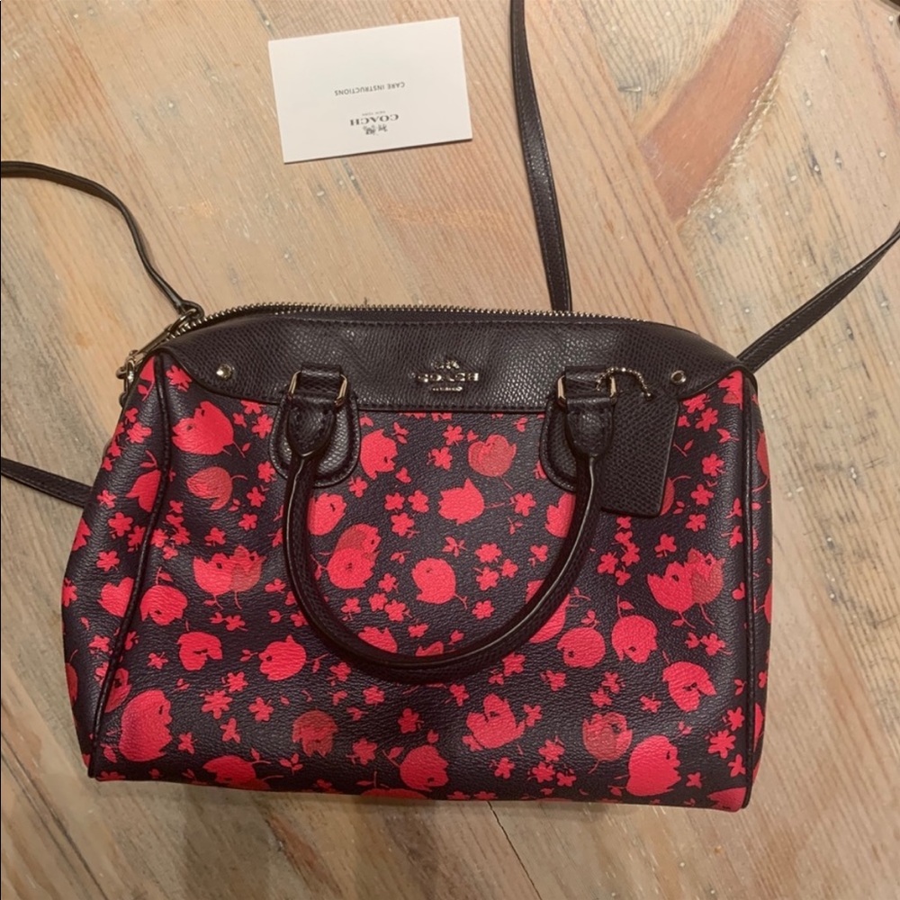 Coach floral print purse.